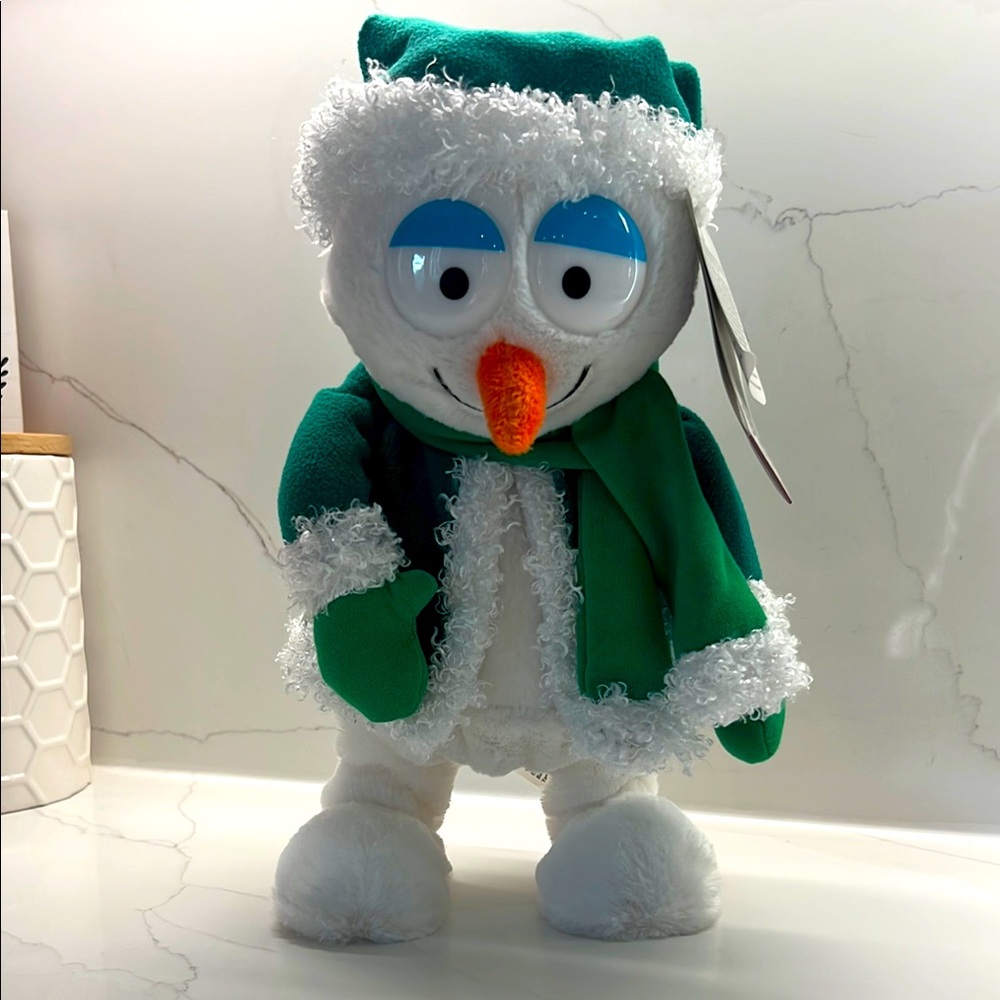 Gemmy dancing snowman in green hat,scarf & coat dances to “Cha Cha Slider” CVS